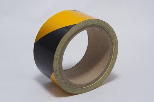 Veszélyre figyelmeztető reflektív szalagok, 100mmx10m-Fekete-Sárga